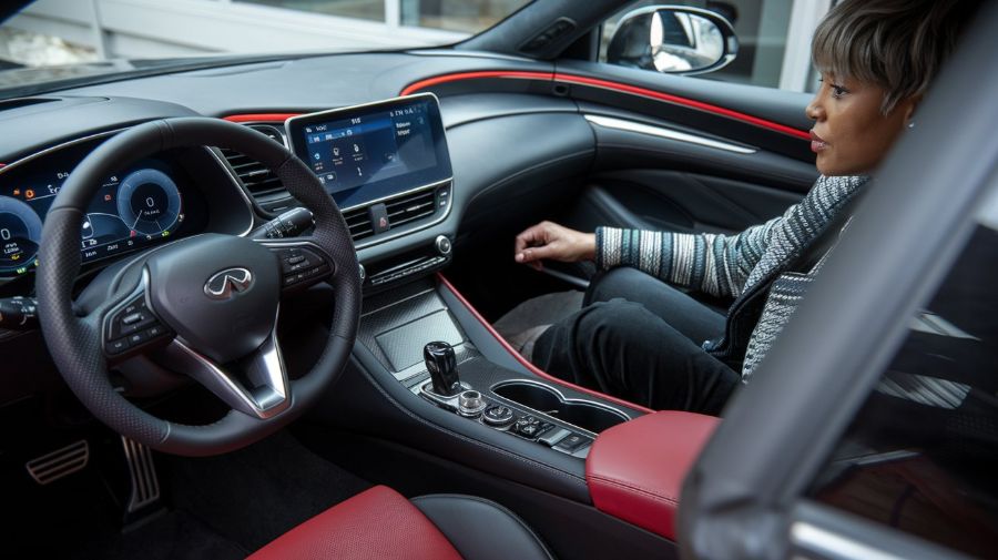Infiniti interior with a woman in the passenger seat Infiniti Certified Collision Repair Infiniti-interior-with-a-woman-in-the-passenger-seat-Infiniti-Certified-Collision-Repair